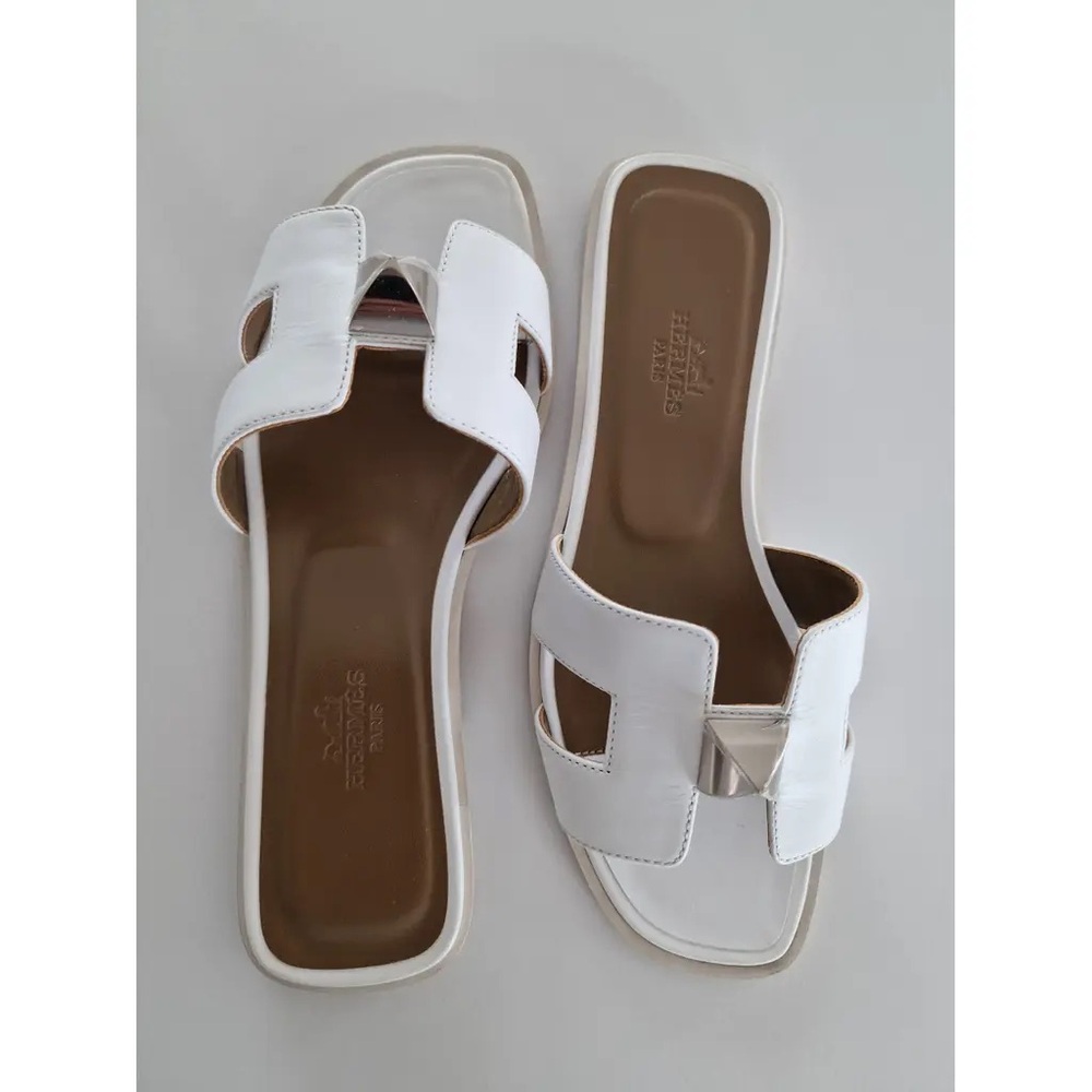 Authentic Hermes Oran White Sandals w/pyramid embellishment